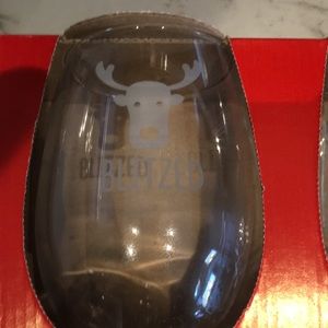 Set of four (4) Christmas themed stemless wine glasses.